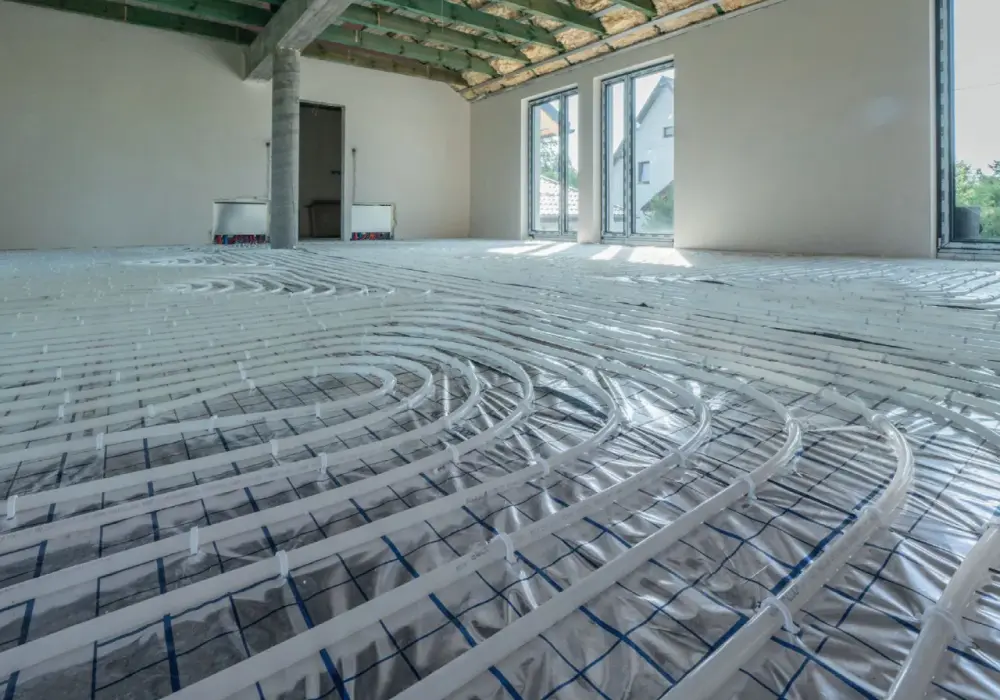 Ogrzewanie podłogowe 100m2 - Ile kosztuje? Wodne czy elektryczne?